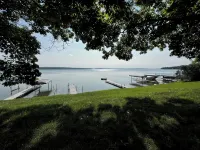 Charming 2-bedroom cabin sits on 2.5 acres on Hubbard Lake.