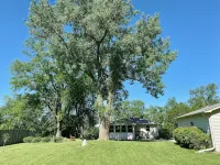 Cheerful two bedroom home in quiet neighborhood. Sun Porch ~ Patio ~  Large yard - Wi-Fi