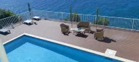 A true oceanfront villa with amazing sunsets and pool. Very nice location. -  Ferienhäuser