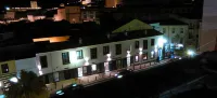 Apartamentos Turísticos la Garza فنادق في Casar de Caceres