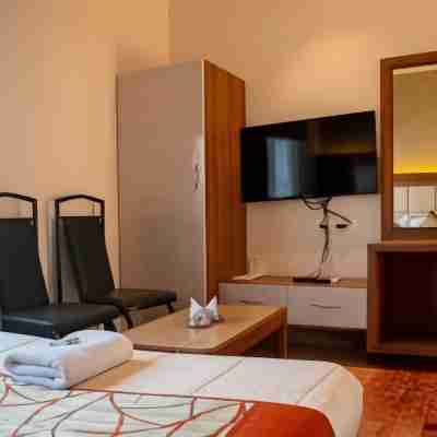 Hotel Rakshit International Rooms