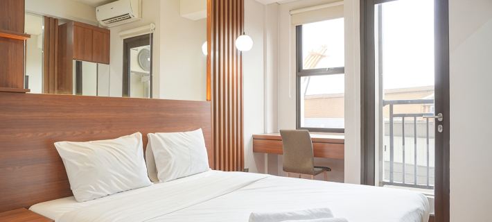 Relaxing and Homey Studio Transpark Cibubur Apartment By Travelio Hotels in Cimanggis