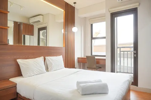 Relaxing and Homey Studio Transpark Cibubur Apartment By Travelio - Wi-Fi