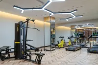 Nanyang Okey Elegant Style Hotel (Wanda Jianye Triumph Square Dushan Avenue Branch) - Gym