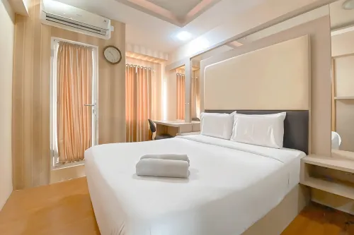 Warm Tone Studio at Candiland Apartment By Travelio