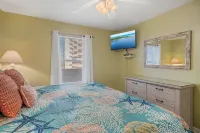 Pelican Beach Resort, Beachfront 10th Floor  , White Beach, Pool, WiFi, Cable TV - 4-Star