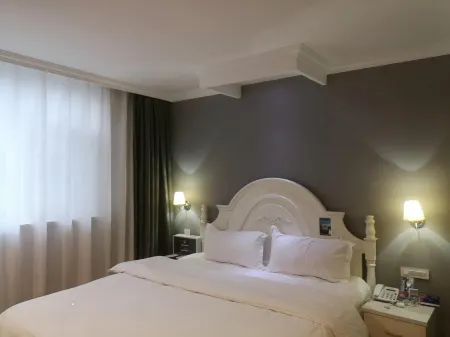 Jiatai Chain Business Hotel (Haicheng Zhanqian Zhongxin Street) Отели рядом с достопримечательностью «Kuixing Building»