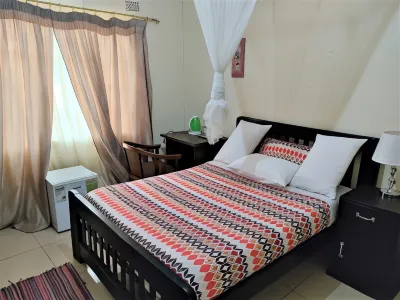 Scm Lodges & Apartments Hotels near Kiboko safaris