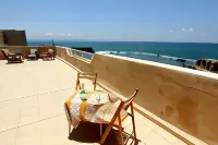 Nzar Khoury for Hosting Hotel di Acre