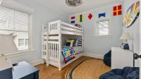 Beautiful new home, professionally decorated with pool close to town and beach
