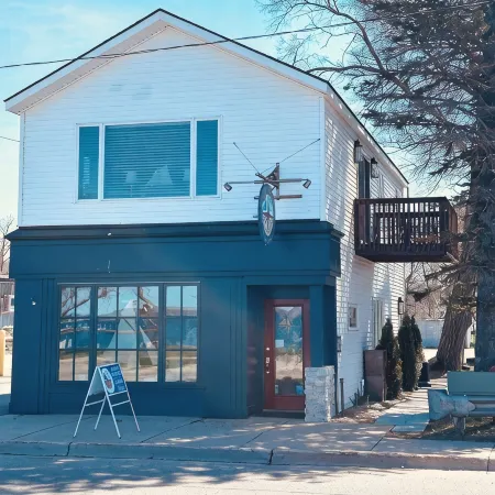 Downtown Boyne City charmer with stunning Lake Charlevoix and Boyne River views.