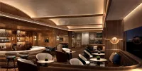 สโลห์ บาย โรช เบงกาลูรู, คิวริโอ คอลเลคชัน บาย ฮิลตัน - ที่มีบาร์