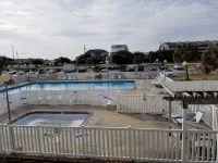 Poolside Ground Floor Studio Unit #125. Just a few steps to the ocean :) - 3-Star