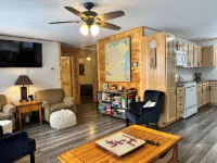 Charming 2-bedroom cottage with WiFi, AC on quiet lake on trails with kayaks. - 2-Star