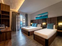 Pebbles Resort Hotels near Ramla Bay