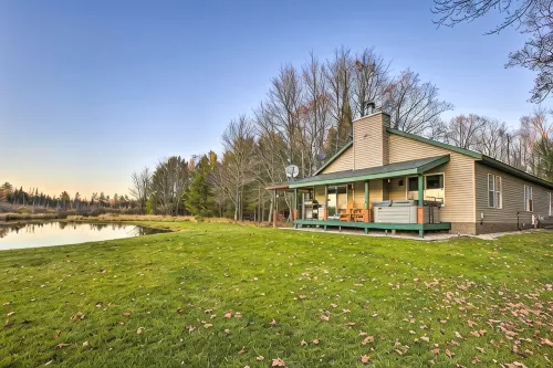 Private Cadillac Gem w/ Kayaks, Hot Tub, Pond, Pool Table and More - 3-Star