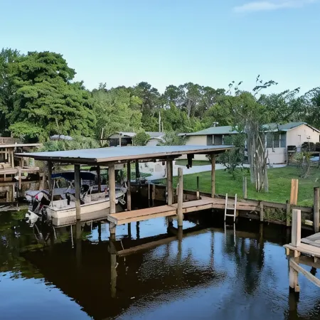 3 BR 2 BA House w/Dock on Deep Canal in Bass Capital