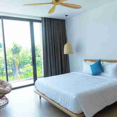 Luxury 4 Bedrooms Riverfront Villa Sanctuary Ho Tram- Cooking,BBQ & Pets allowed Rooms