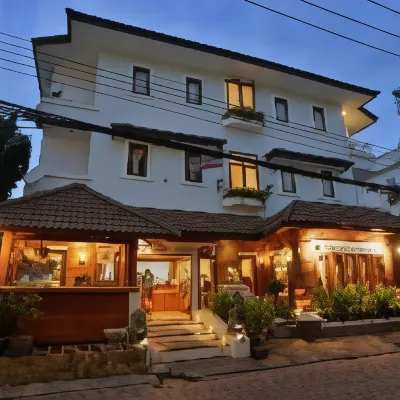 Sripat Guesthouse Отели рядом с достопримечательностью «Ворота Чанг Пуак»