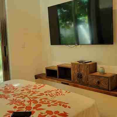This home features lush garden & private pool. Rooms