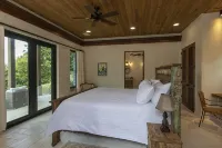 Walk to world famous Maho Bay! Privacy, views, pool, 4 equal king size bedrooms. - balcony