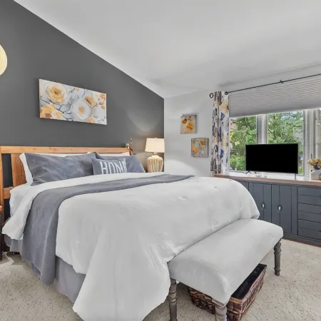 Winter Getaway with Cozy Fireplace in This Elegant Lake Geneva Condo & King Bed.
