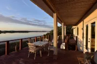 WATERFRONT Home  - Dolphins, Sunsets, Fishing, Kayaks, Canoe, Wildlife - balcony