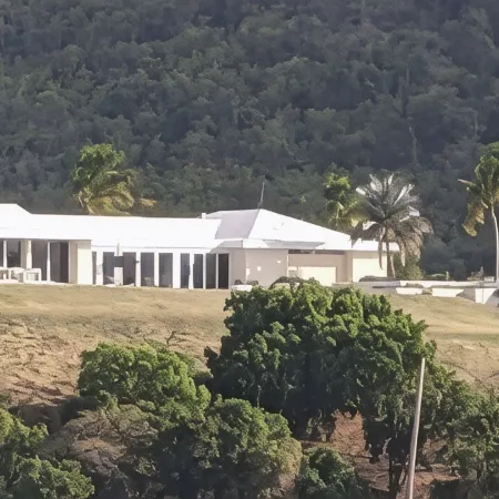 Beautiful 7.7 acre estate with a huge home and stunning views of the Caribbean