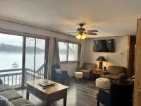 Charming 2-bedroom cottage with WiFi, AC on quiet lake on trails with kayaks. - 2-Star
