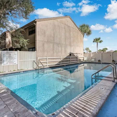 Beautifully Remodeled Townhouse Steps from the Shore – Pool & Garage Included