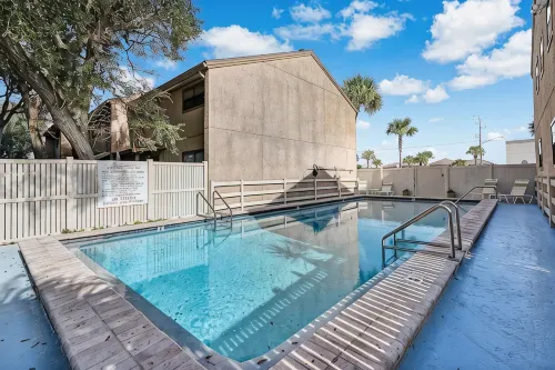 Beautifully Remodeled Townhouse Steps from the Shore – Pool & Garage Included