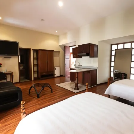 Suites & Hotel El Quijote