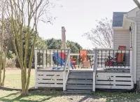 Newly Renovated, 4Bd 2 BA, 1 Full Acre, Sleeps 8, and is Pet Friendly.