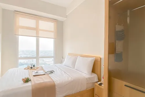 Simple Look 1BR Apartment near MM2100 at Vasanta Innopark By Travelio - Homestays