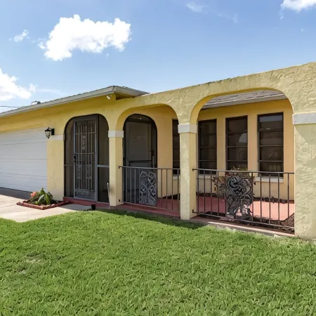 Waterfront Heated Pool Retreat with Dock Pet Friendly Sleeps 6 in Cape Coral