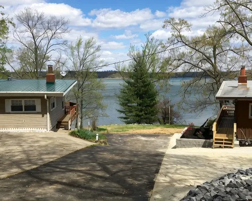 Experience Kentucky Lake out the back door! Spacious 4-bedroom retreat awaits. Hotels in Calloway County