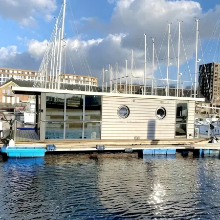 Houseboat Luv in Sonwik harbor with a view of Denmark
