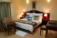 Moba Hotel & Convention Centre Hotels near Nkana Canyon