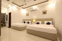 Cuzzy Inn Hotel