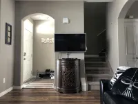 Spacious 4-bedroom townhome in charming Red Deer with WiFi, AC