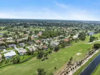 Pristine Luxury Heated Pool Home on the Golf Course Hotels in Lely