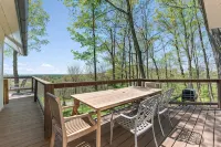 Unique and secluded A frame home on 31 acres with hot tub.