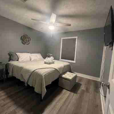 Spacious 4-bedroom house in Columbus with privacy fence situated in the county! Rooms
