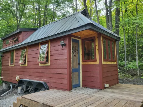 Tiny bungalow secluded in the woods with lake view.  Pets accepted!