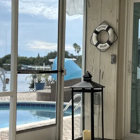 Paradise!Canal-River front heated pool house with Gulf ofMexico access.Remodeled