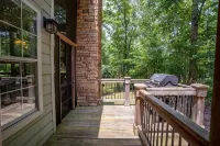 Breathtaking porch just steps from the water.