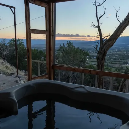 Home on the mesa’s edge the Proverbial Million Dollar View, jacuzzi and orchard
