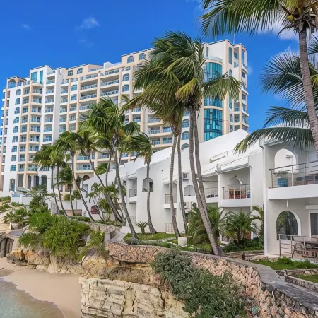 Beachfront condo at beautiful Cupecoy Beach Club.  2 bedroom, 3 bath, amenities!