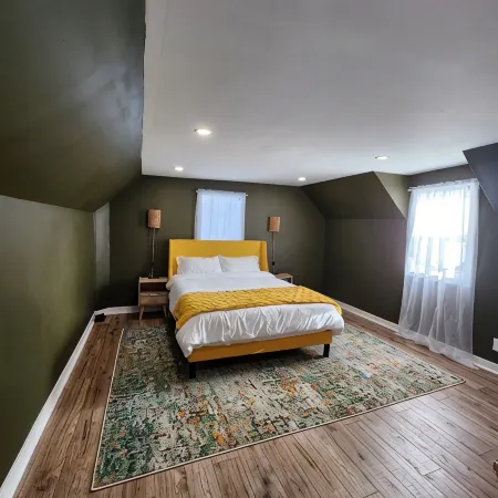 This is a private second-floor suite with its own entrance.