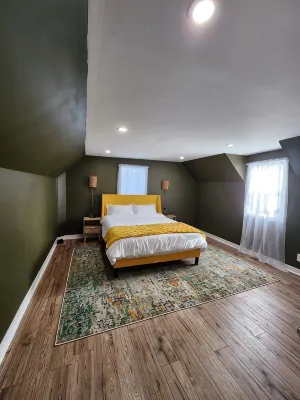 This is a private second-floor suite with its own entrance.